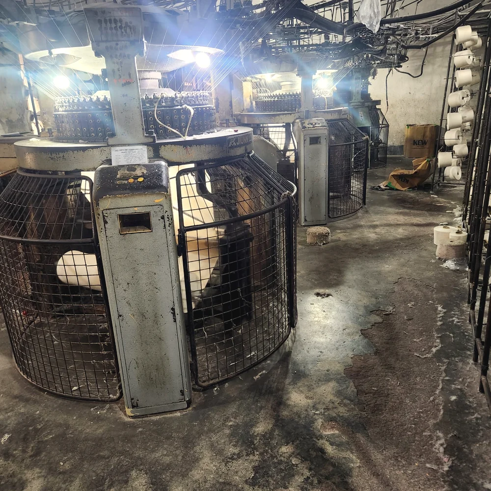 Circular knitting machines producing jersey fabric in a Bangladesh knitting unit