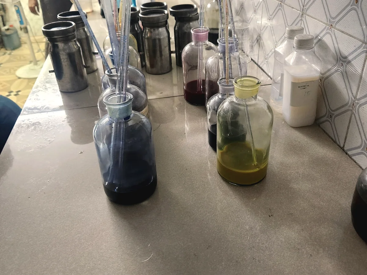 Colour lab bench with dye and ink samples prepared for print and decoration shade matching